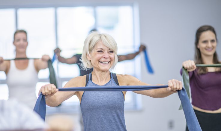 senior woman in exercise class