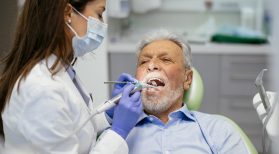 Senior man at the dentist